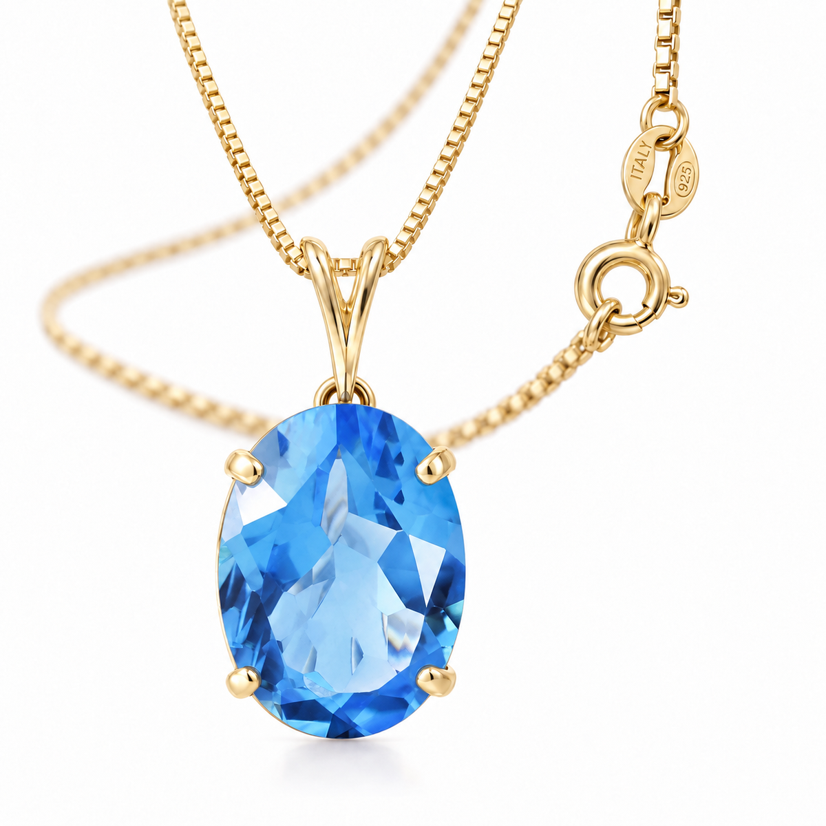 Yellow Gold Gemma lab-grown Blue Topaz necklace, close-up with chain and clasp detail.