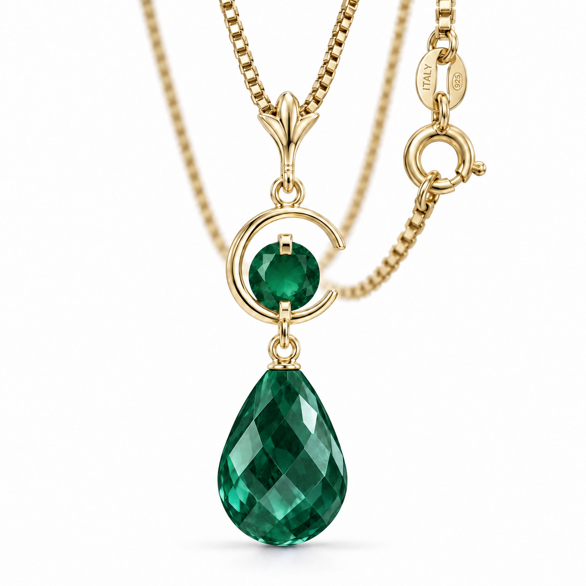 Yellow Gold Nicolina lab-grown Emerald necklace, close-up with chain and clasp detail.