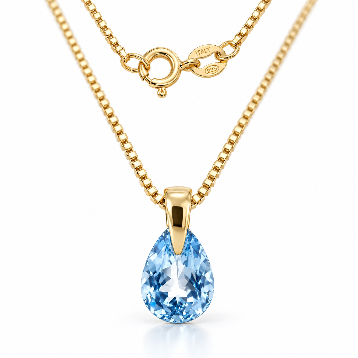 Yellow Gold Liberata natural blue topaz necklace, shown with chain and clasp detail.