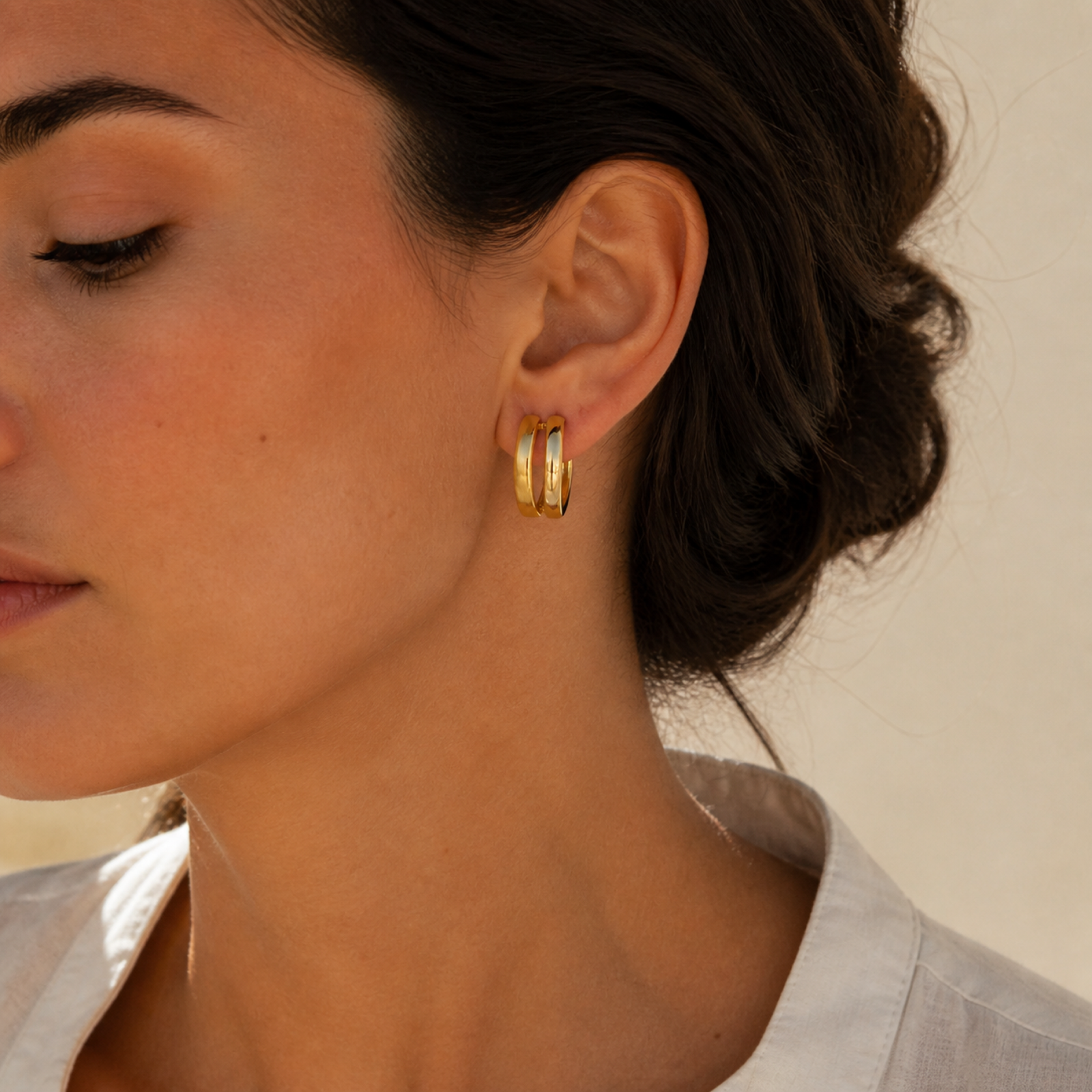 Yellow Gold — Doppio Luce Huggie Earrings — view 4