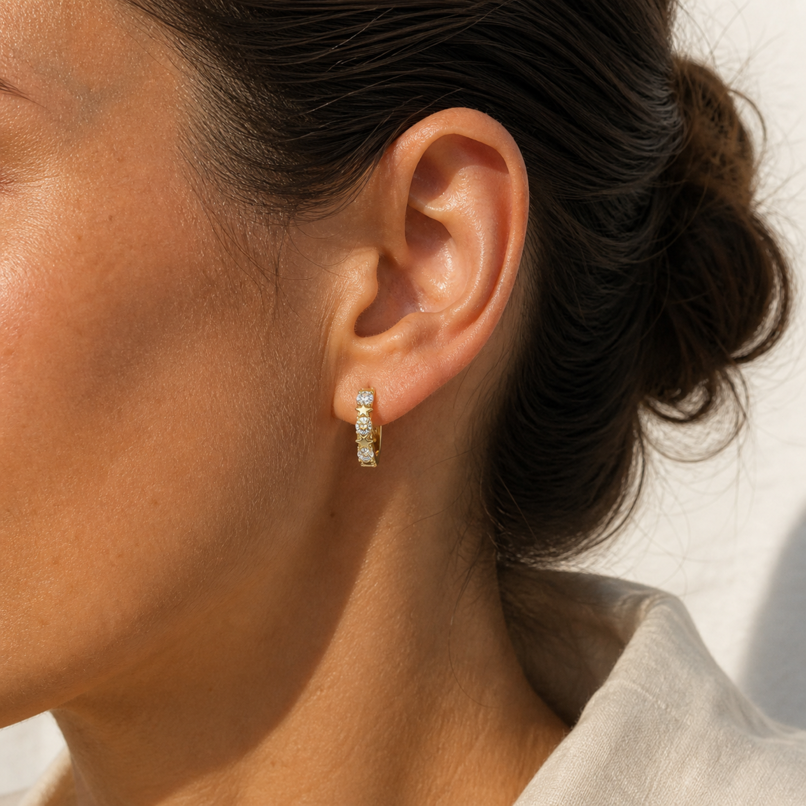 Yellow Gold — Stellina White Sapphire Huggie Earrings — view 4