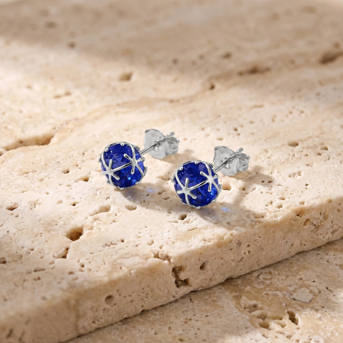 White Gold Sapphire Stud Earrings — Alida — travertine lifestyle