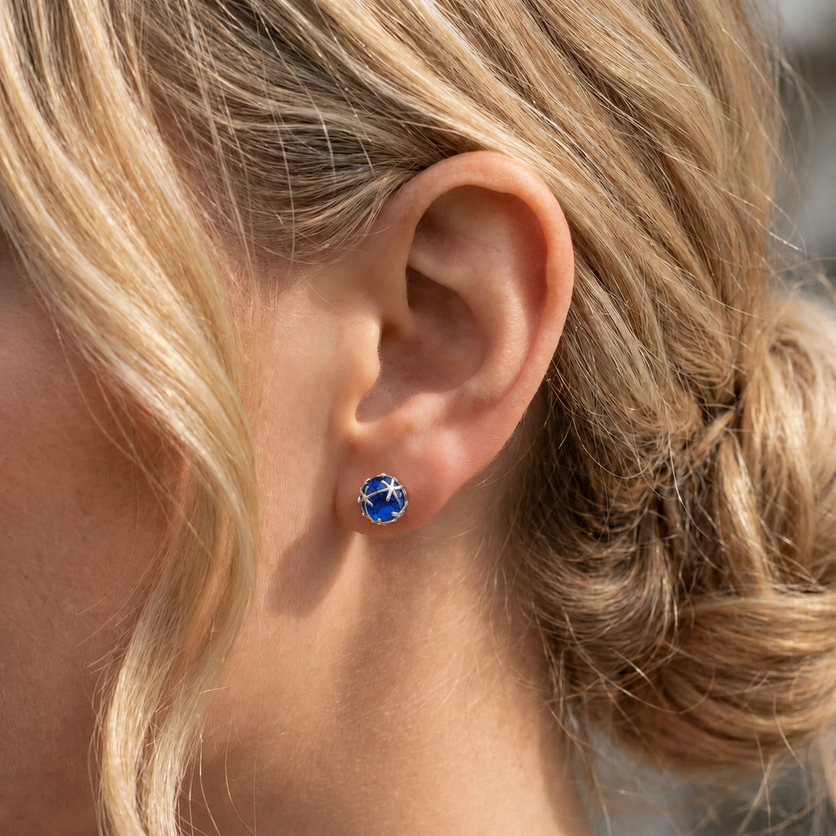 White Gold Sapphire Stud Earrings — Alida — model close-up