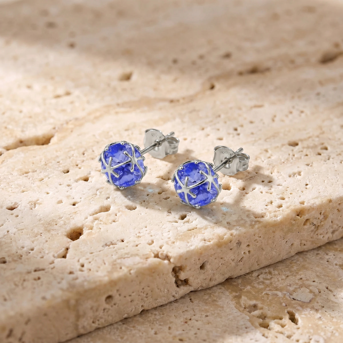 White Gold Tanzanite Stud Earrings — Alida — travertine lifestyle