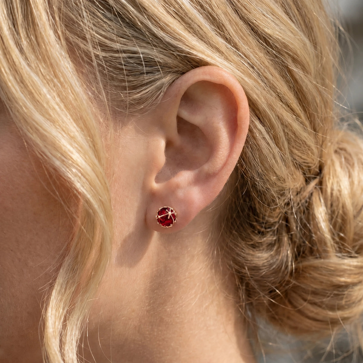 Rose Gold Ruby Stud Earrings — Alida — model close-up