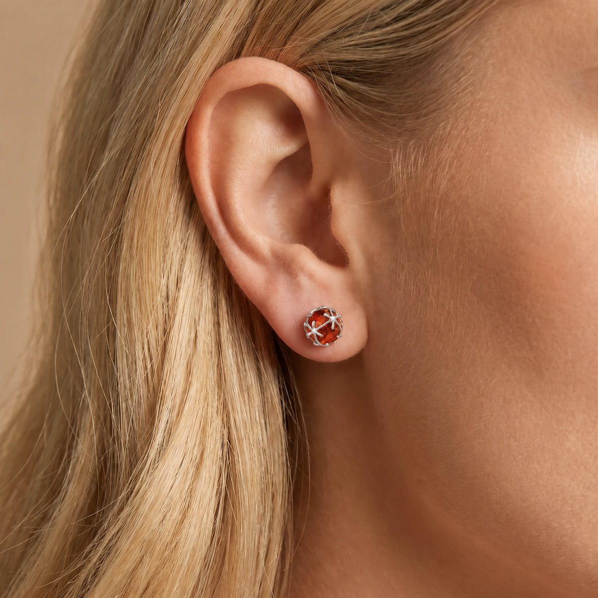 White Gold Garnet Stud Earrings — Alida — model portrait