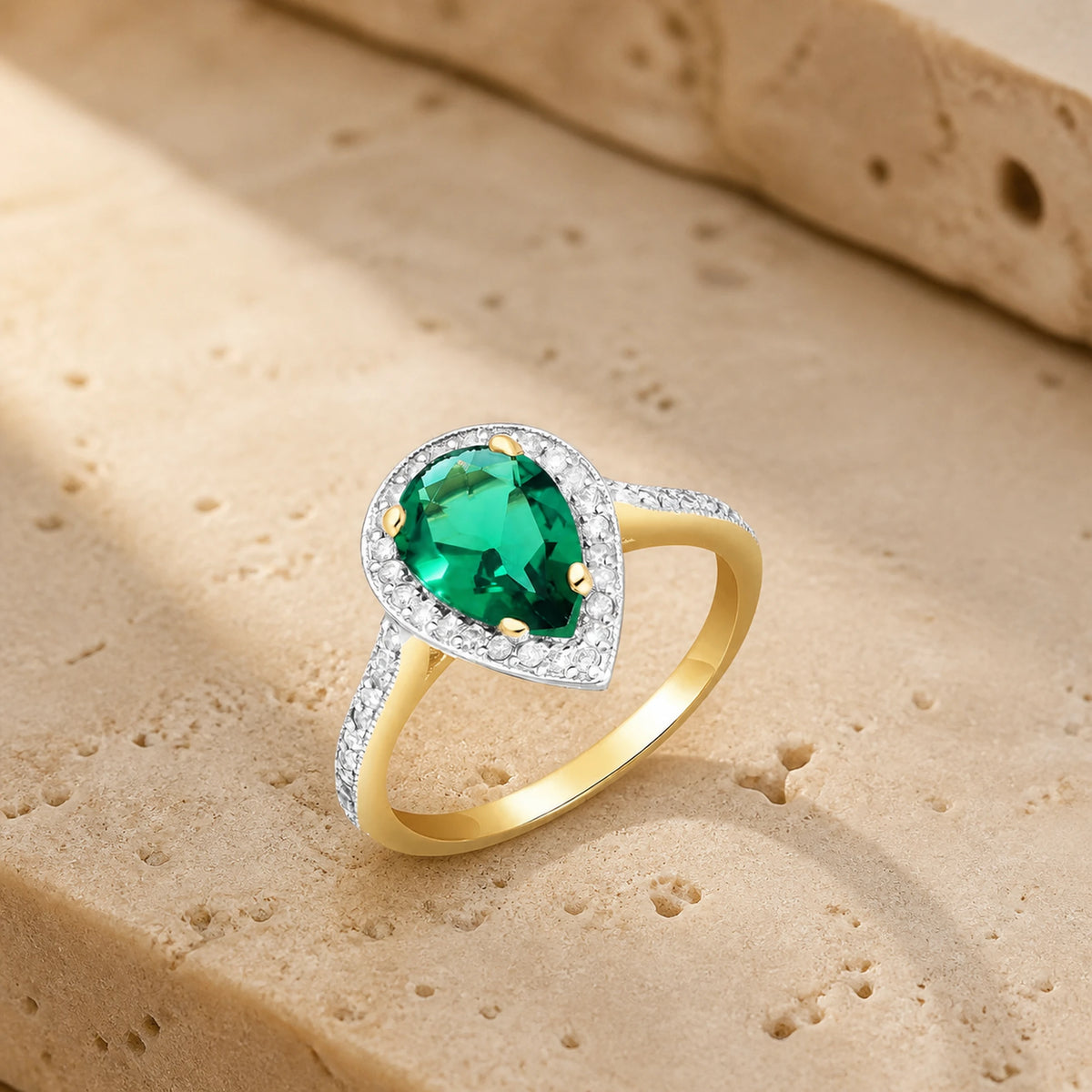 Yellow Gold Emerald Ring — Marcella Cel — travertine lifestyle