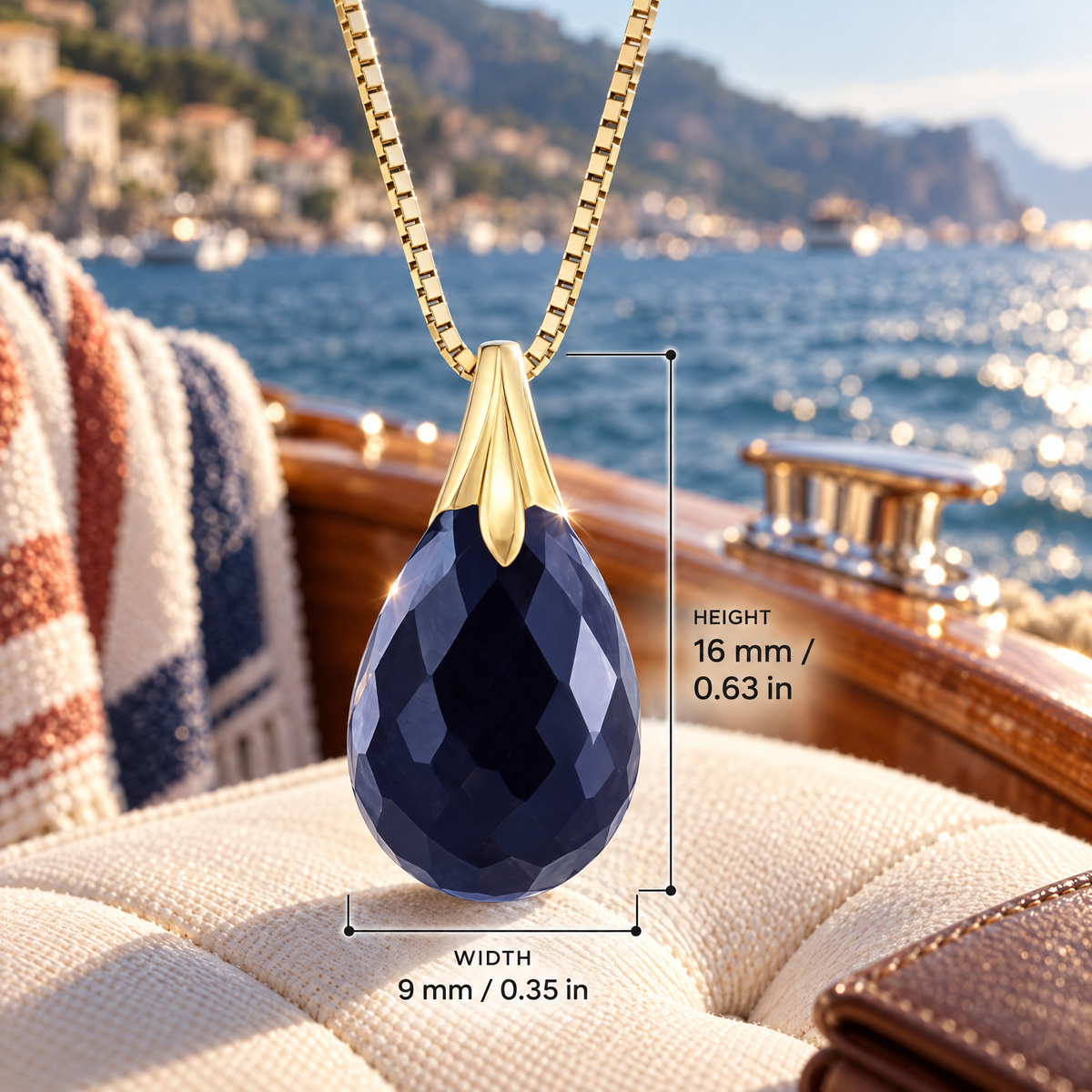 Yellow Gold Amabile sapphire pendant with dimensions: 16 mm high and 9 mm wide, against a boat setting.