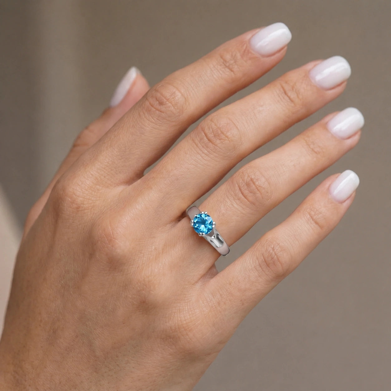 White Gold Blue Topaz — Consolata