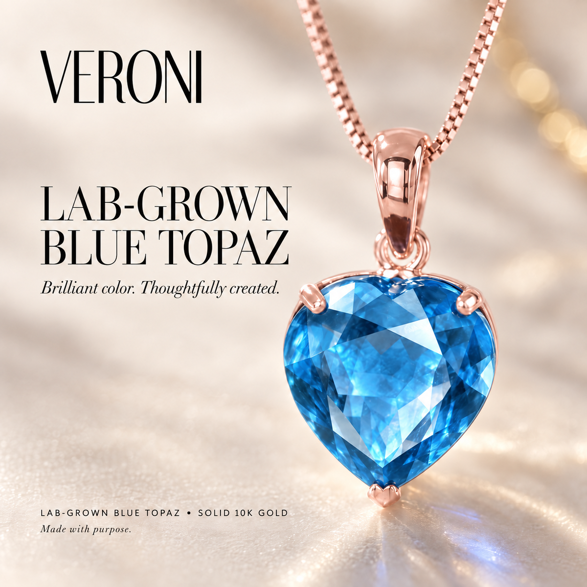 Rose Gold Giuseppa lab-grown Blue Topaz necklace, VERONI gemstone campaign.