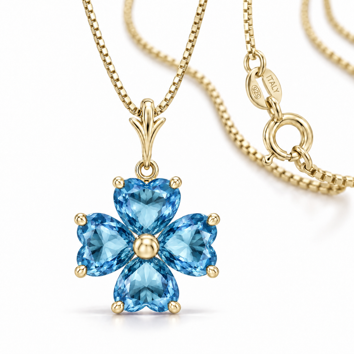 Yellow Gold Selene lab-grown Blue Topaz necklace, close-up with chain and clasp detail.