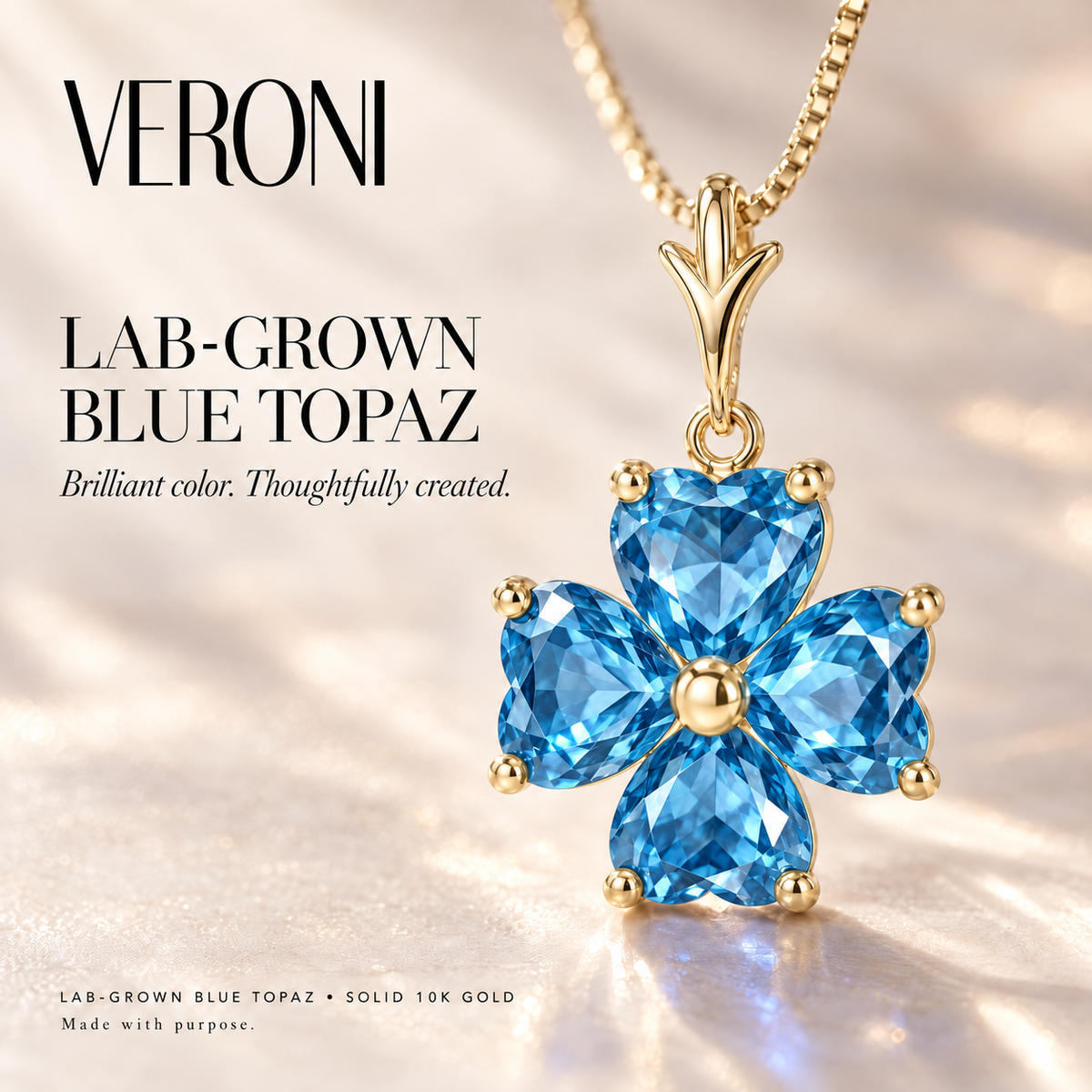 Yellow Gold Selene lab-grown Blue Topaz necklace, in a VERONI campaign.