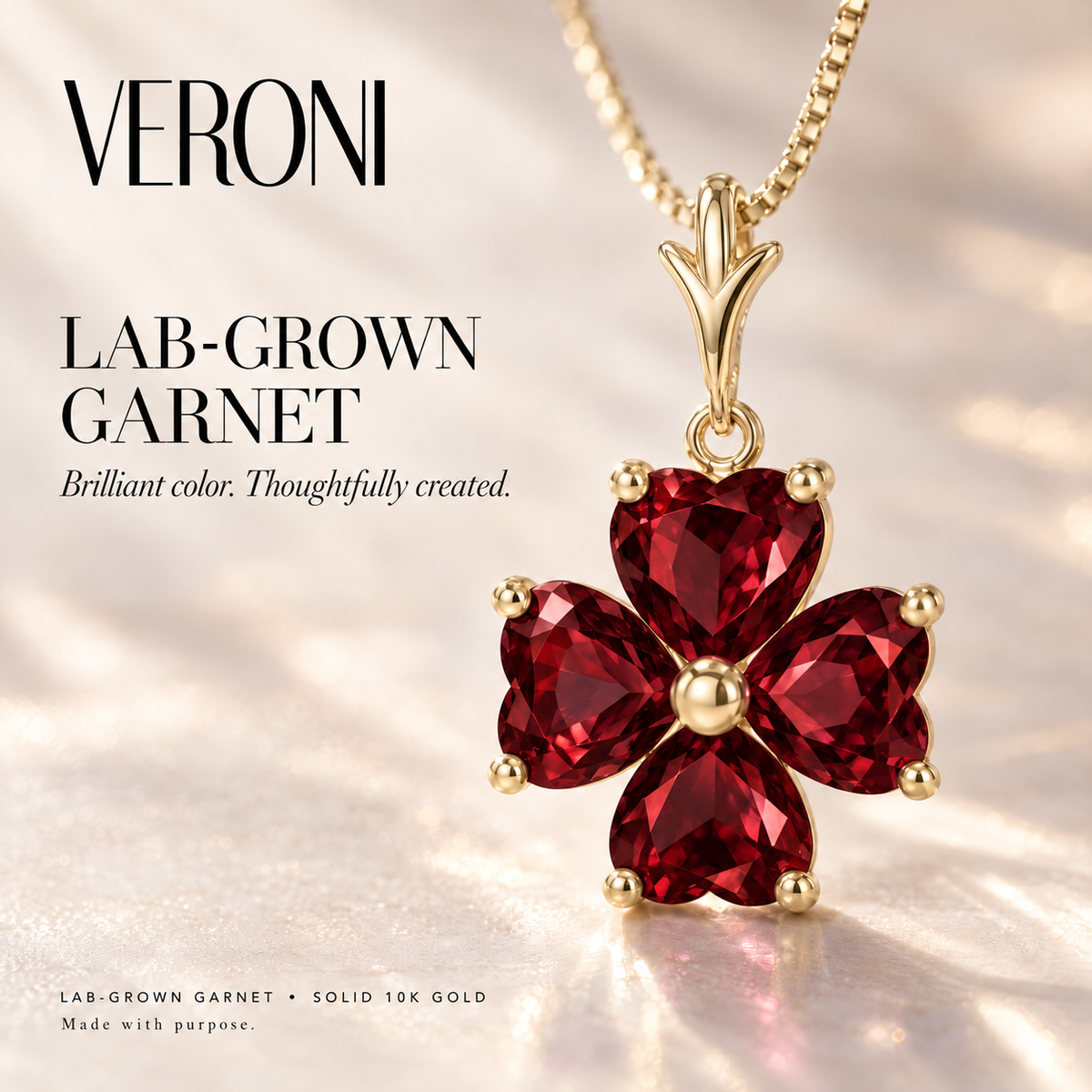 Yellow Gold Selene lab-grown Garnet necklace, in a VERONI campaign.
