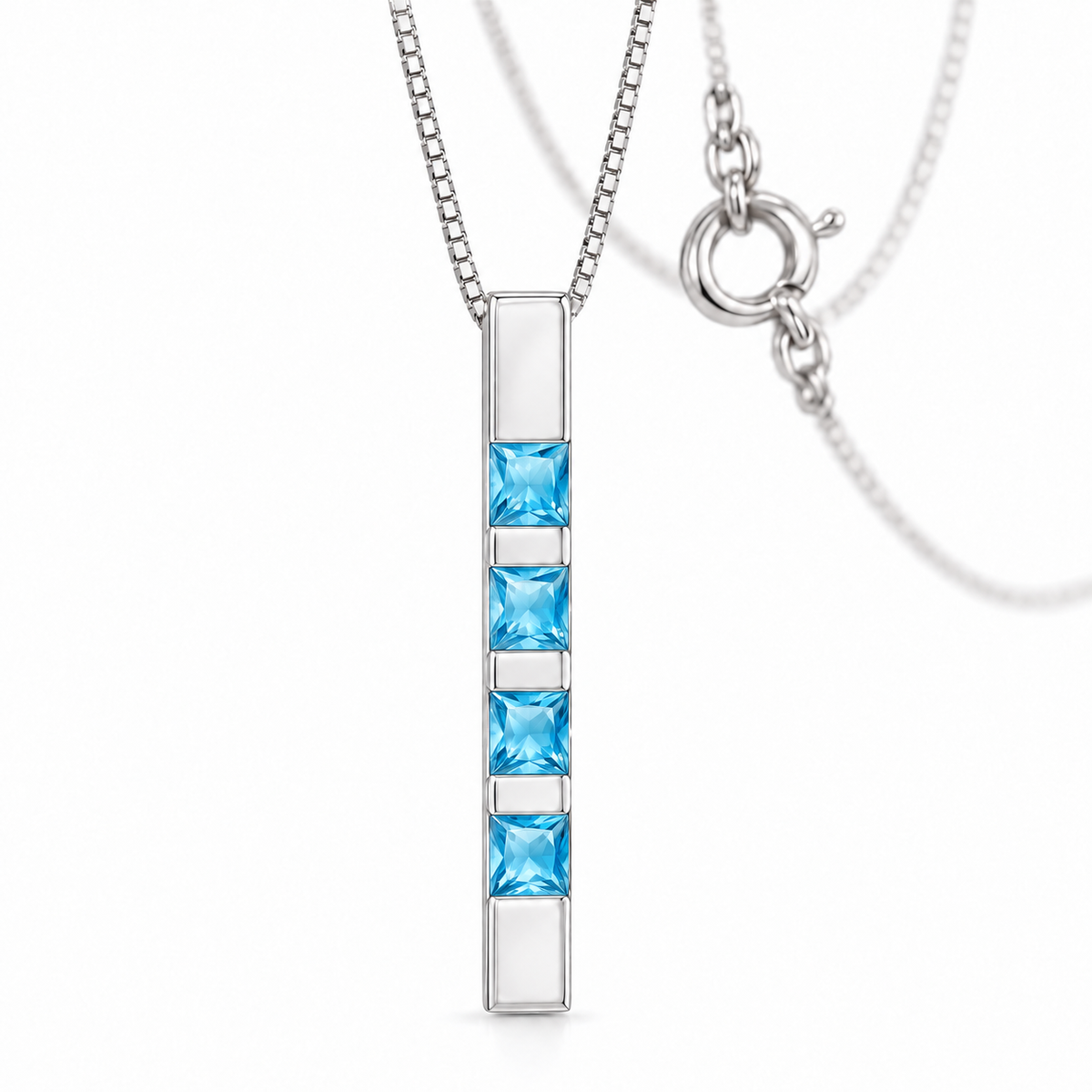 White Gold Gioconda lab-grown blue topaz necklace, shown with chain and clasp detail.