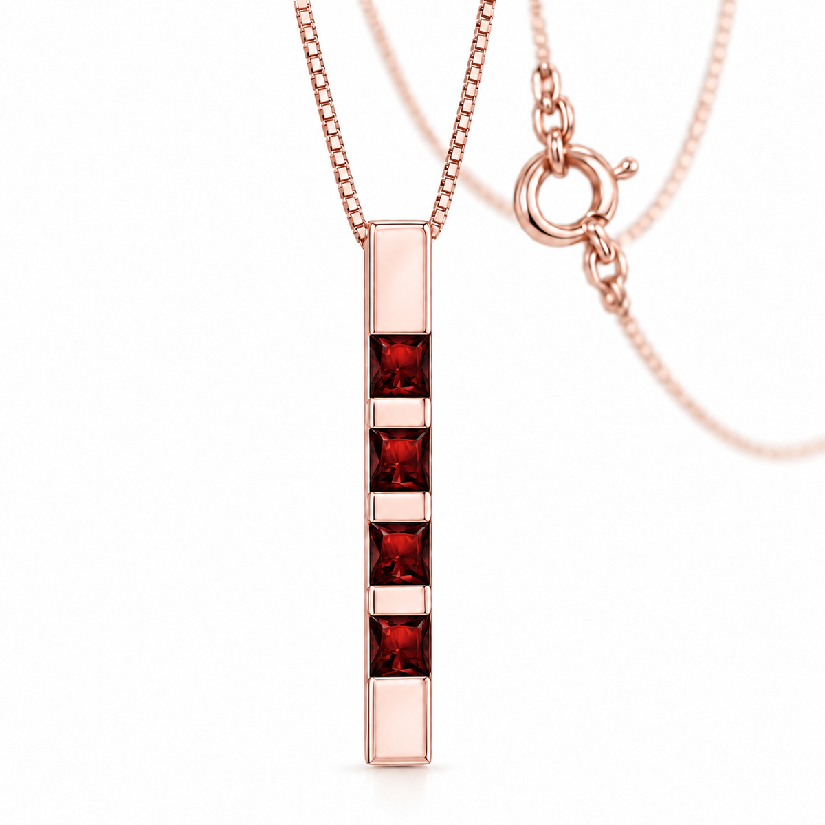 Rose Gold Gioconda lab-grown garnet necklace, shown with chain and clasp detail.