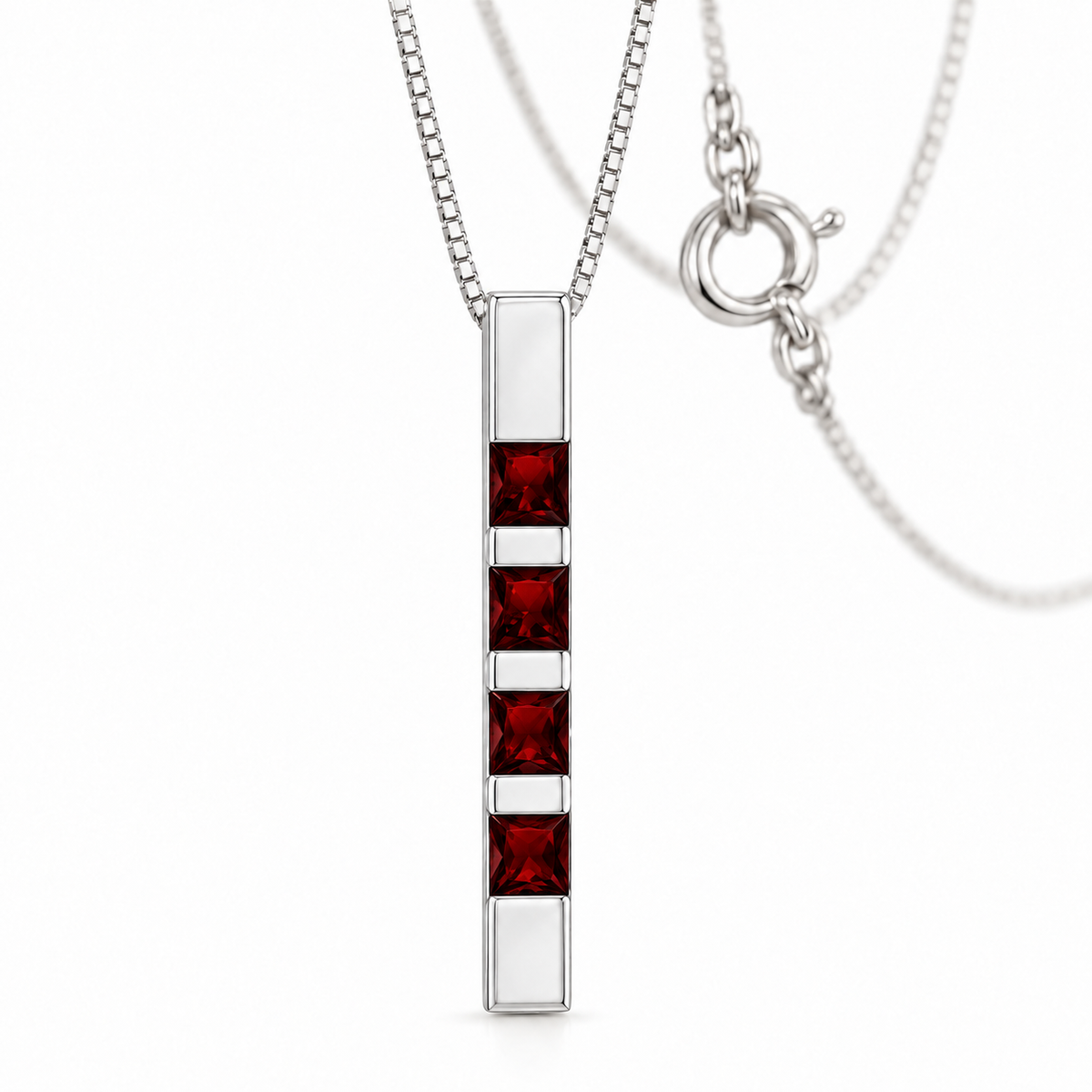 White Gold Gioconda lab-grown garnet necklace, shown with chain and clasp detail.