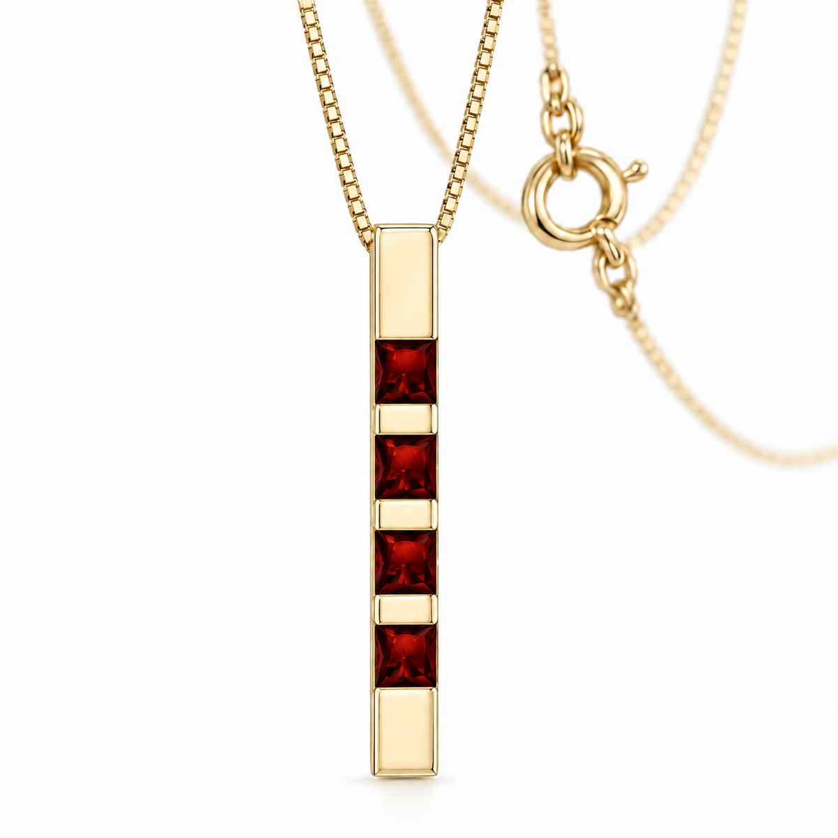 Yellow Gold Gioconda lab-grown garnet necklace, shown with chain and clasp detail.