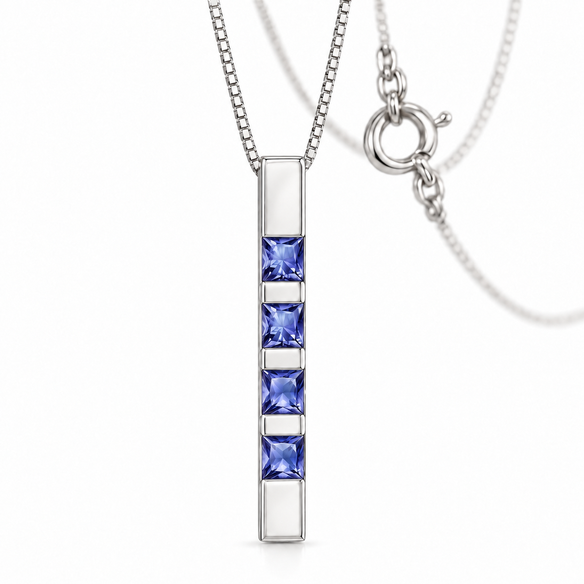 White Gold Gioconda lab-grown tanzanite necklace, shown with chain and clasp detail.