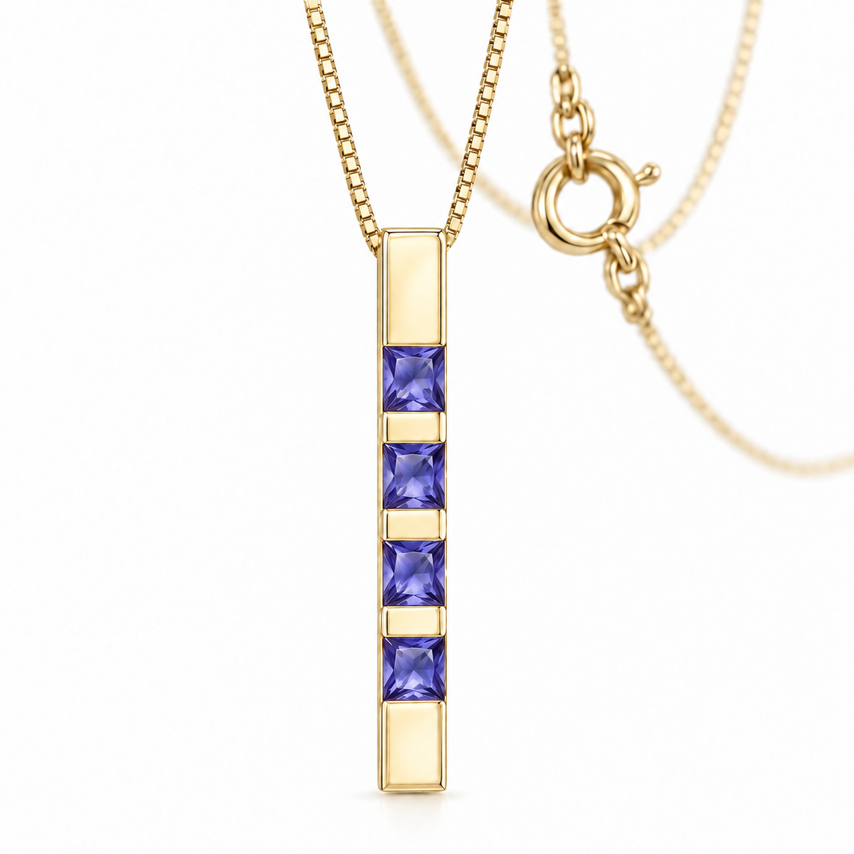 Yellow Gold Gioconda lab-grown tanzanite necklace, shown with chain and clasp detail.