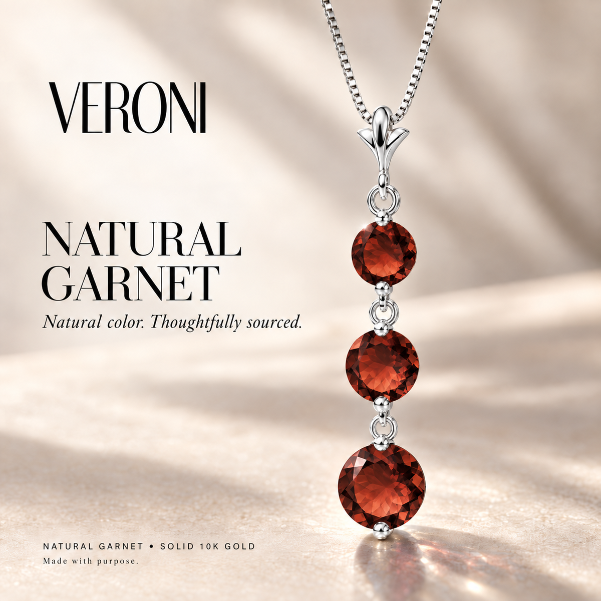 White Gold Provvidenza natural garnet necklace, in a VERONI campaign.
