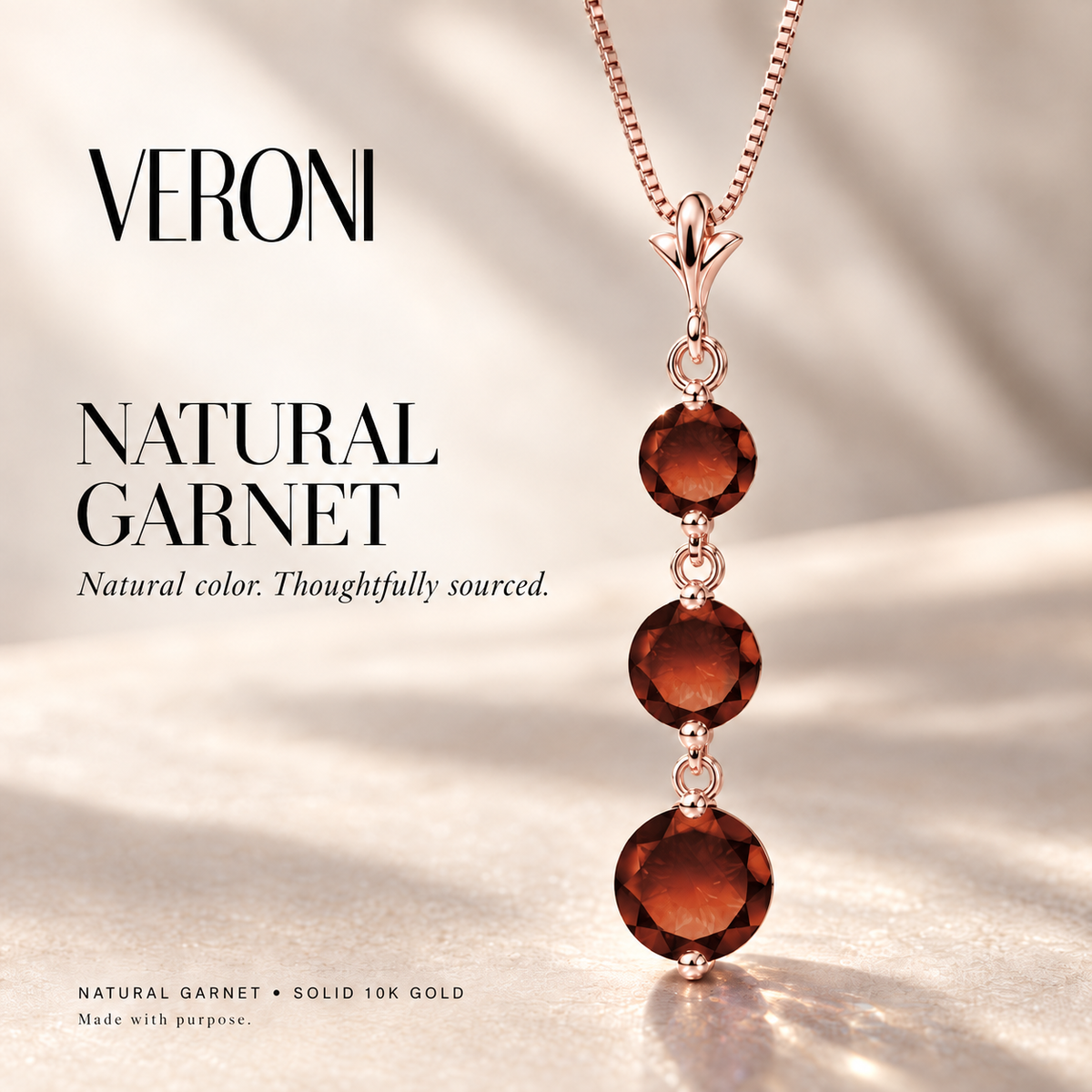 Rose Gold Provvidenza natural garnet necklace, in a VERONI campaign.