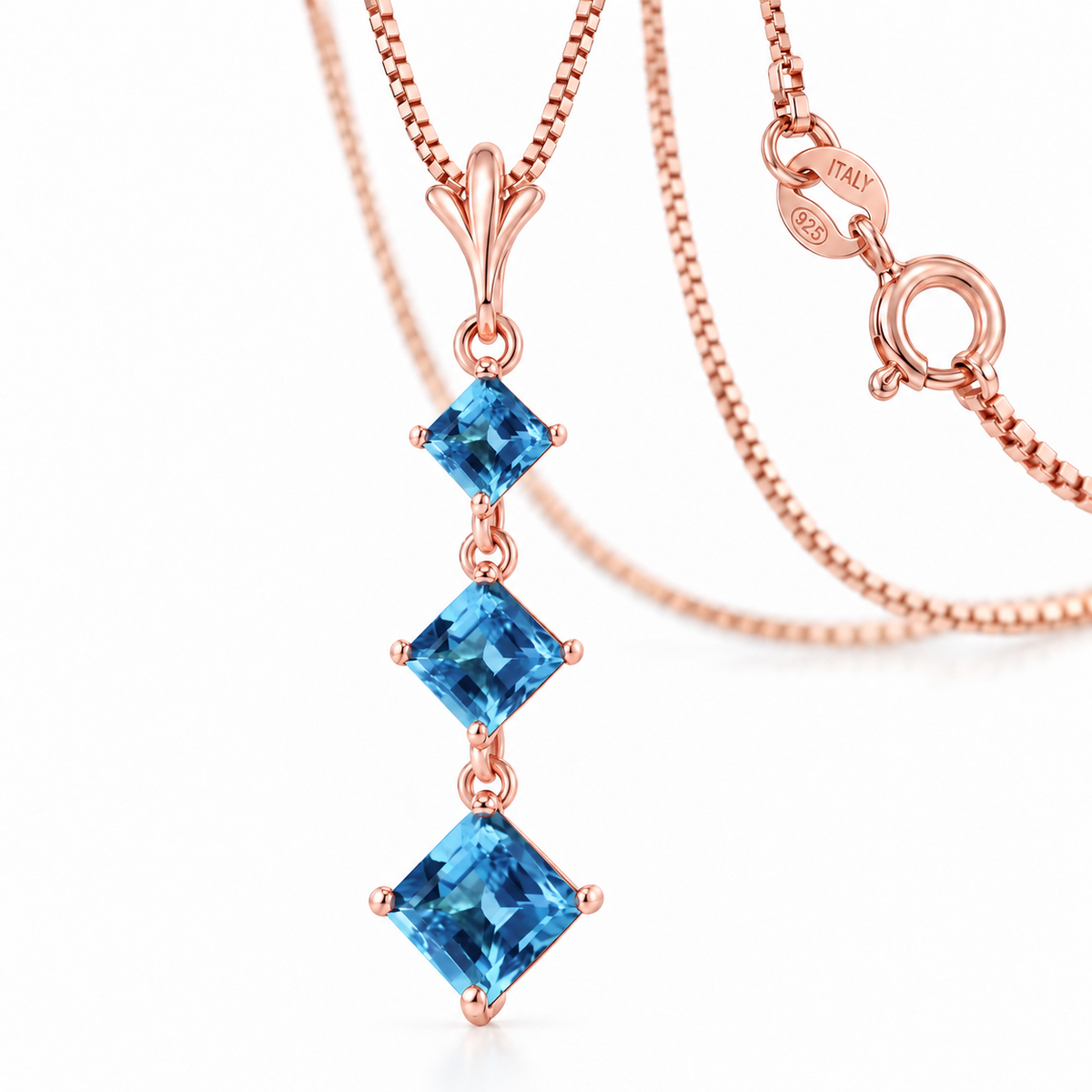 Rose Gold Pia natural blue topaz necklace, shown with chain and clasp detail.