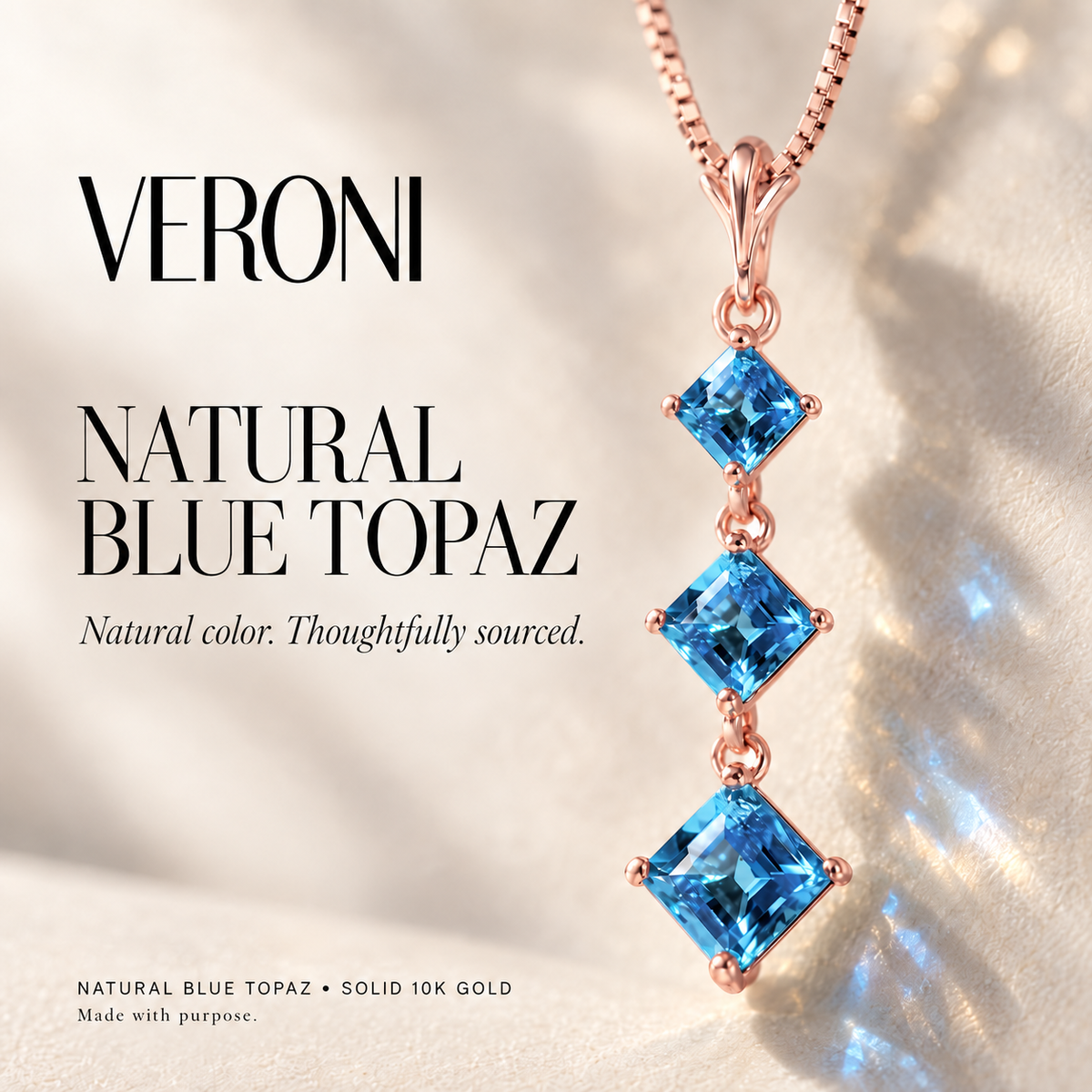 Rose Gold Pia natural blue topaz necklace, in a VERONI campaign.