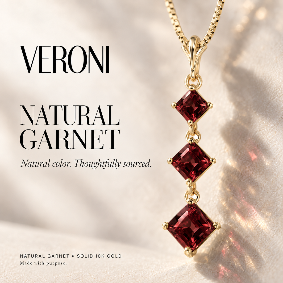 Yellow Gold Pia natural garnet necklace, in a VERONI campaign.