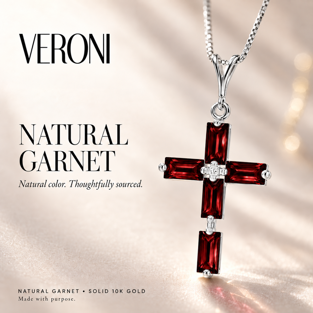 White Gold Emilia natural garnet necklace, in a VERONI campaign.