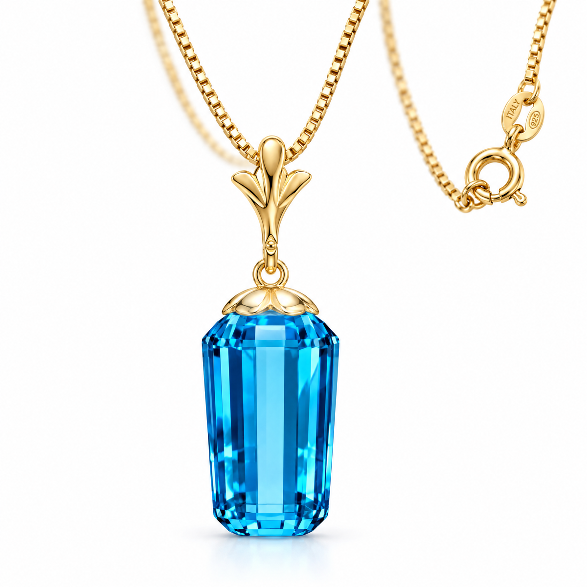 Yellow Gold Flora natural blue topaz necklace, shown with chain and clasp detail.