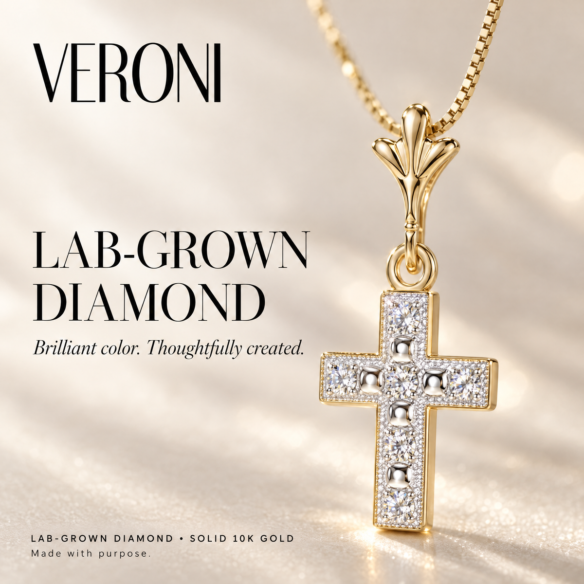 Yellow Gold Egle lab-grown diamond pendant on a warm ivory background in a VERONI campaign.