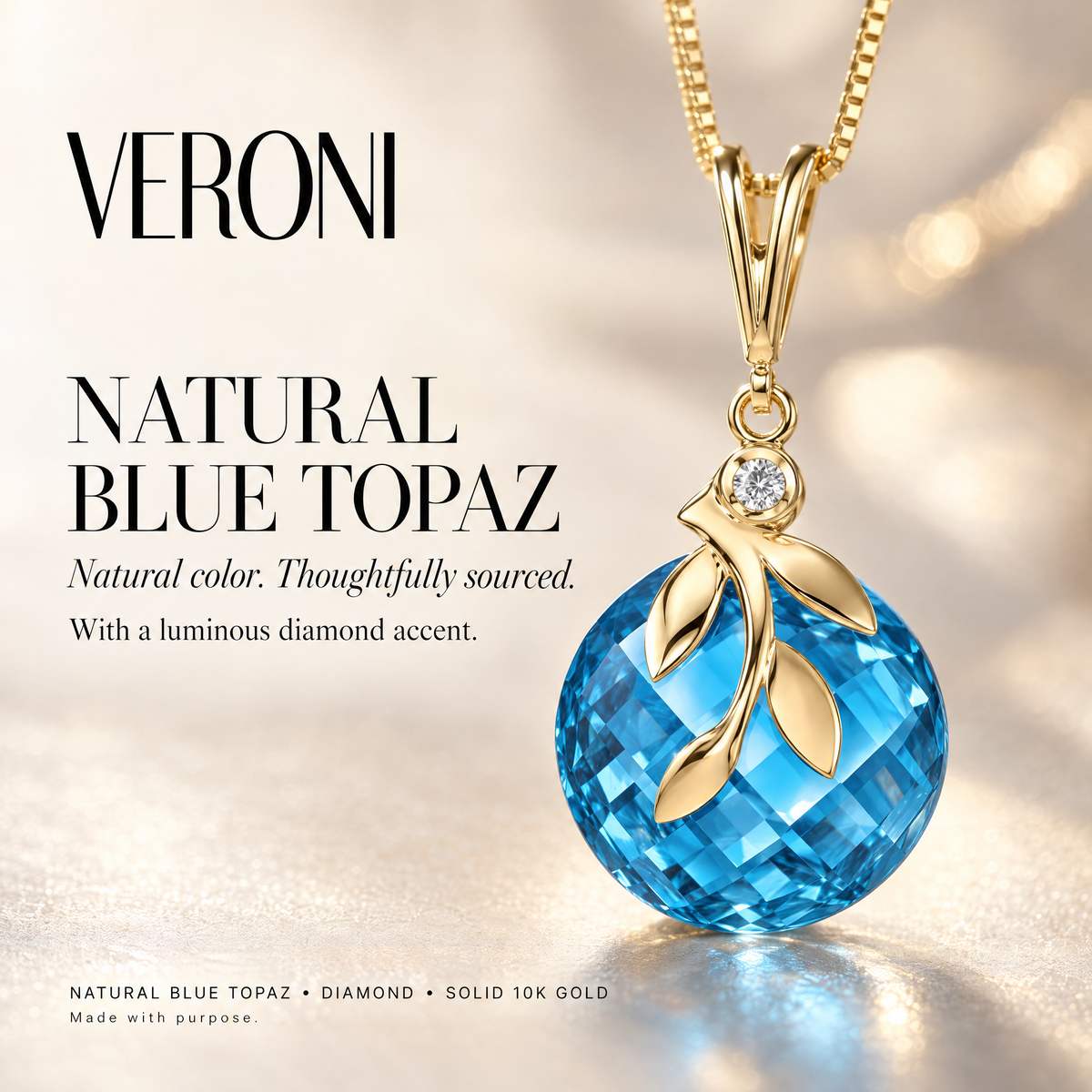 Yellow Gold Adalgisa natural blue topaz and diamond pendant on a warm ivory background in a VERONI campaign.