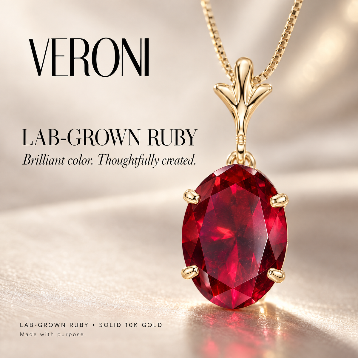 Yellow Gold Guendalina lab-grown ruby pendant on a warm ivory background in a VERONI campaign.