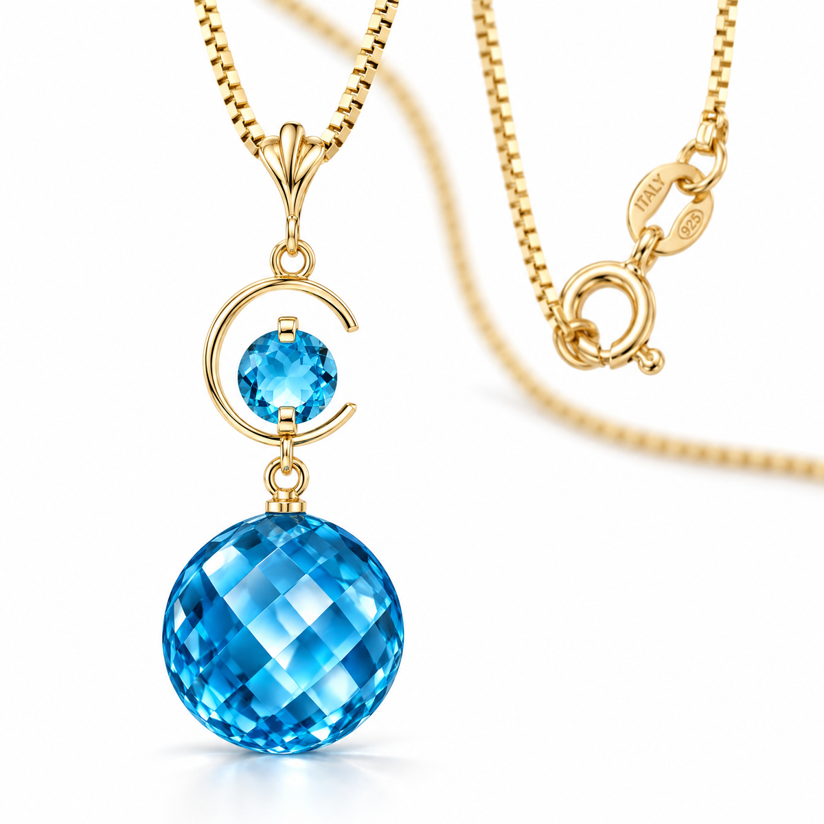 Yellow Gold Evelina natural blue topaz necklace, shown with chain and clasp detail.