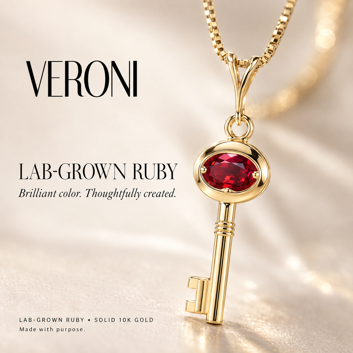 Yellow Gold Marcella lab-grown ruby pendant on a warm ivory background in a VERONI campaign.
