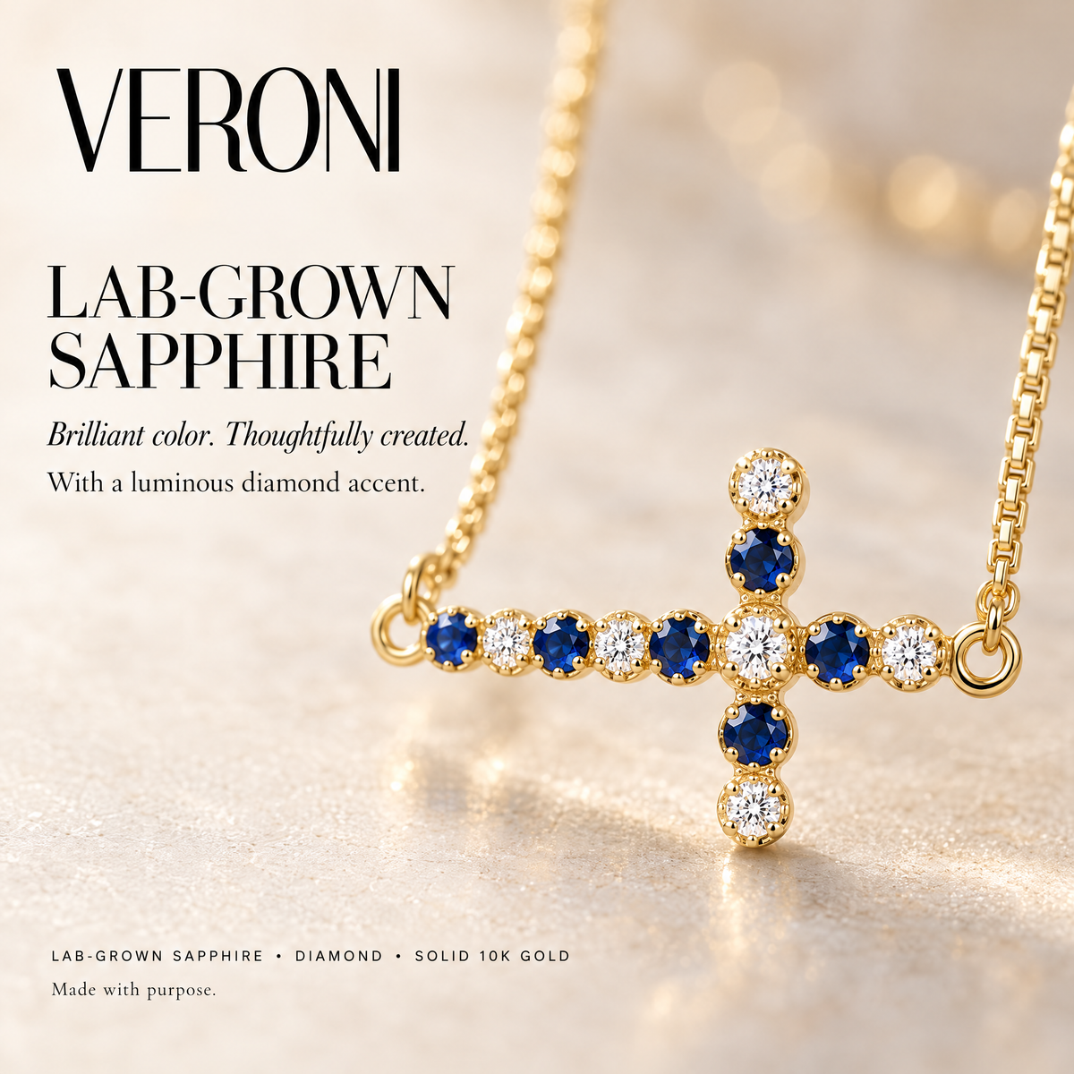 Yellow Gold Liberata lab-grown sapphire and diamond pendant on a warm ivory background in a VERONI campaign.