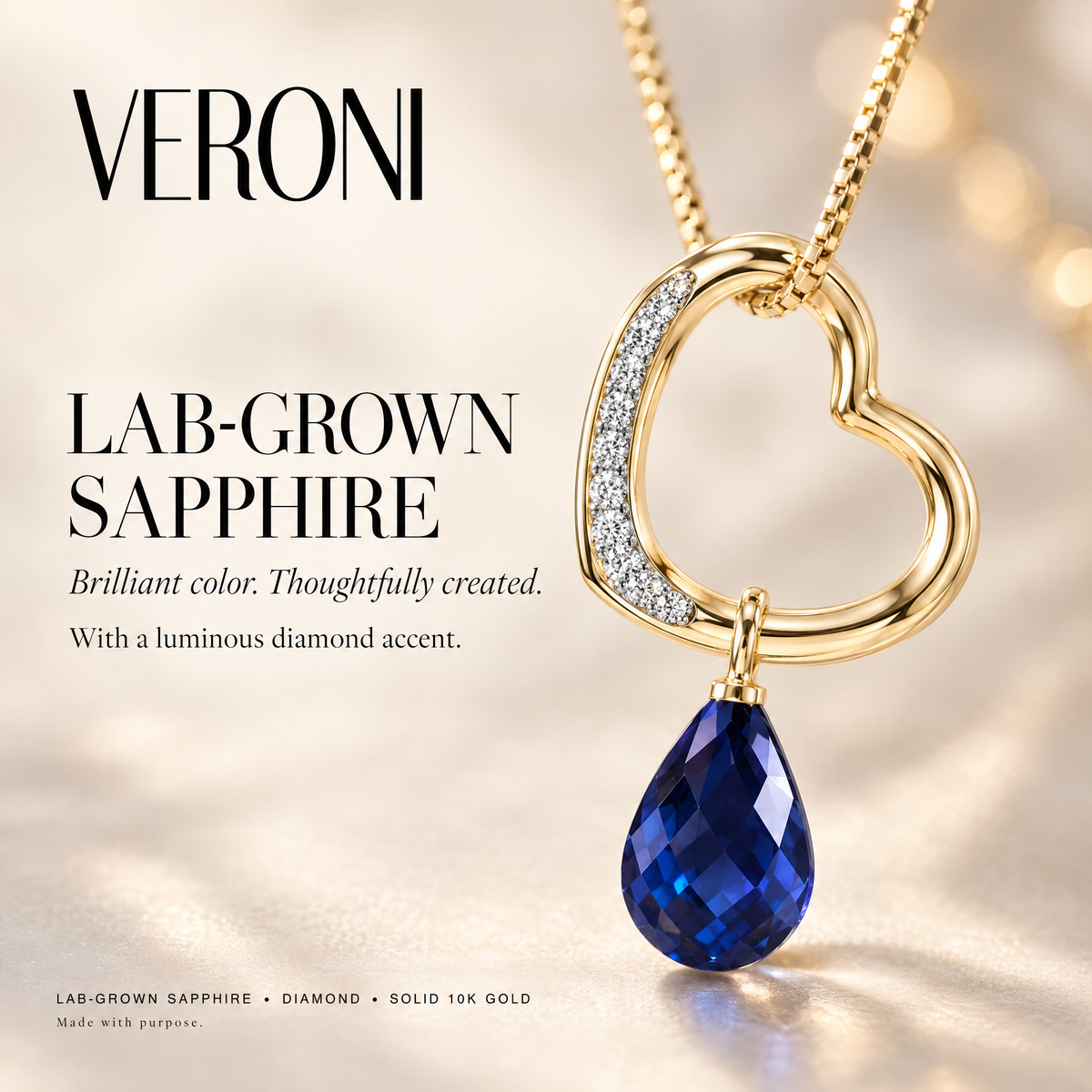 Yellow Gold Romilda lab-grown sapphire and diamond pendant on a warm ivory background in a VERONI campaign.