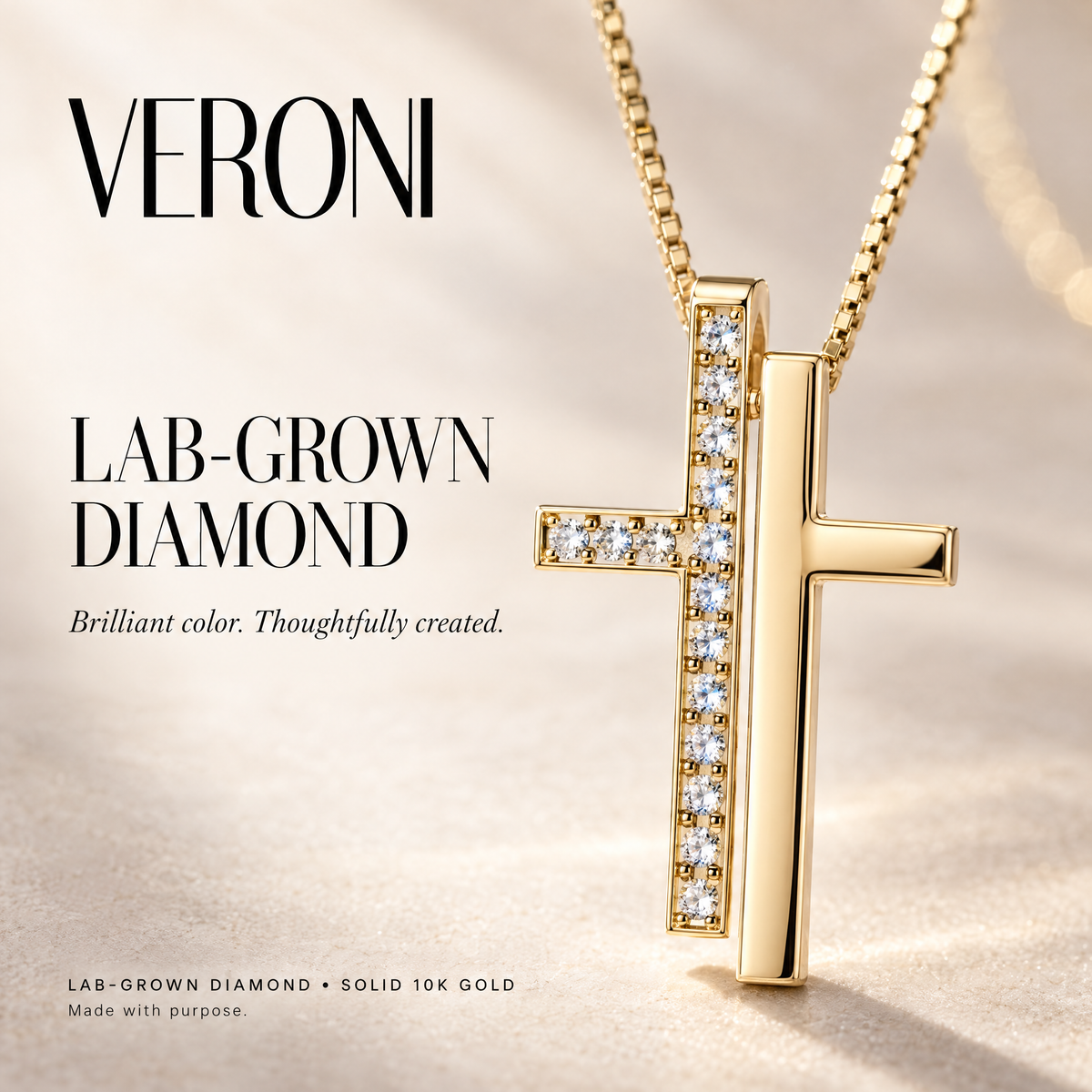 Yellow Gold Fulvia lab-grown diamond pendant on a warm ivory background in a VERONI campaign.