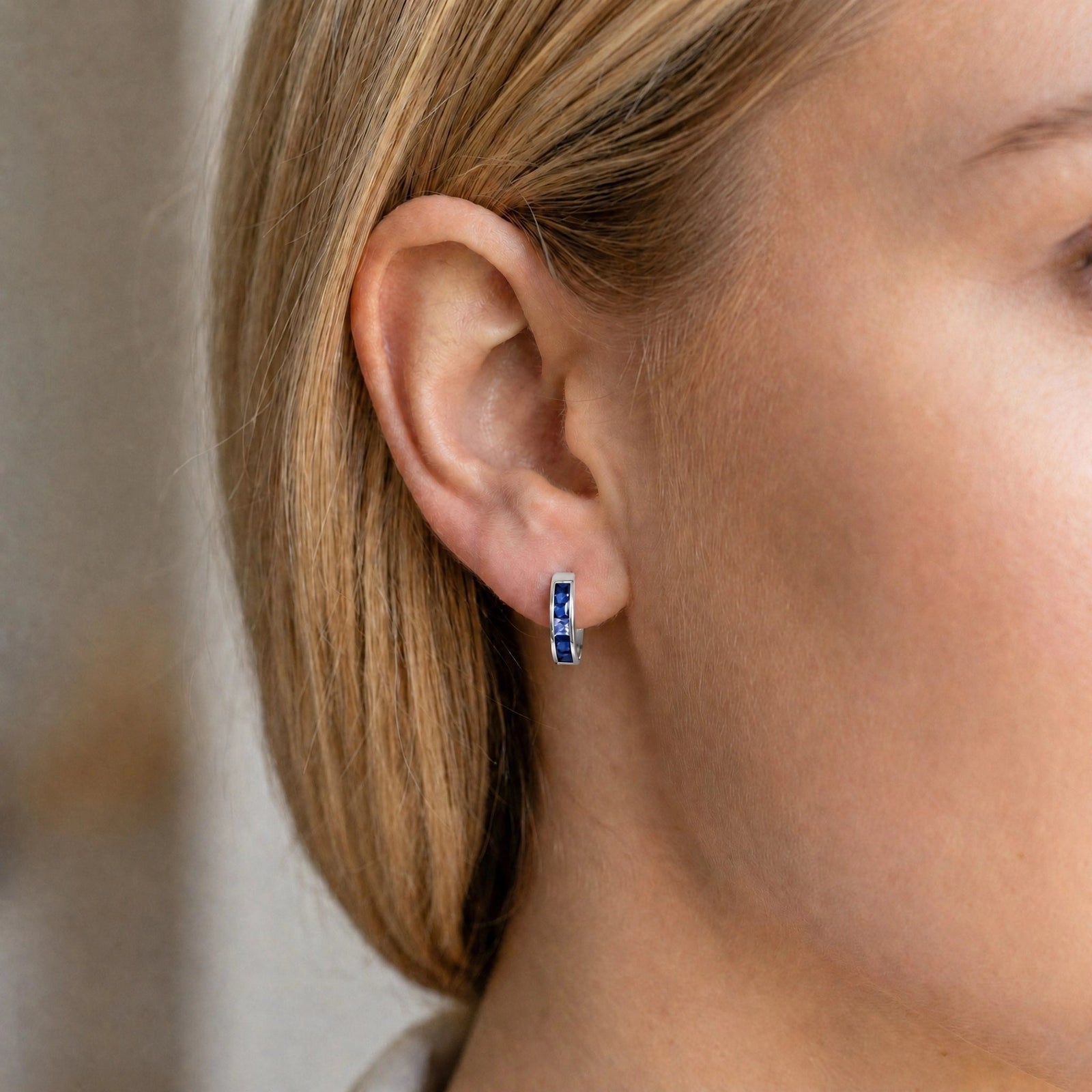 White Gold Huggie Earrings Emerald 10K — Drusilla